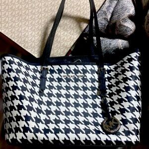Black and white Michael Kors purse